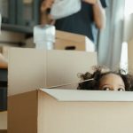 A cat cautiously exploring a new home after a move