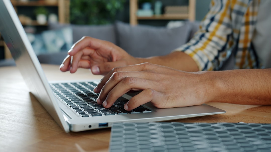 Volunteer handling administrative tasks for a cat rescue from home