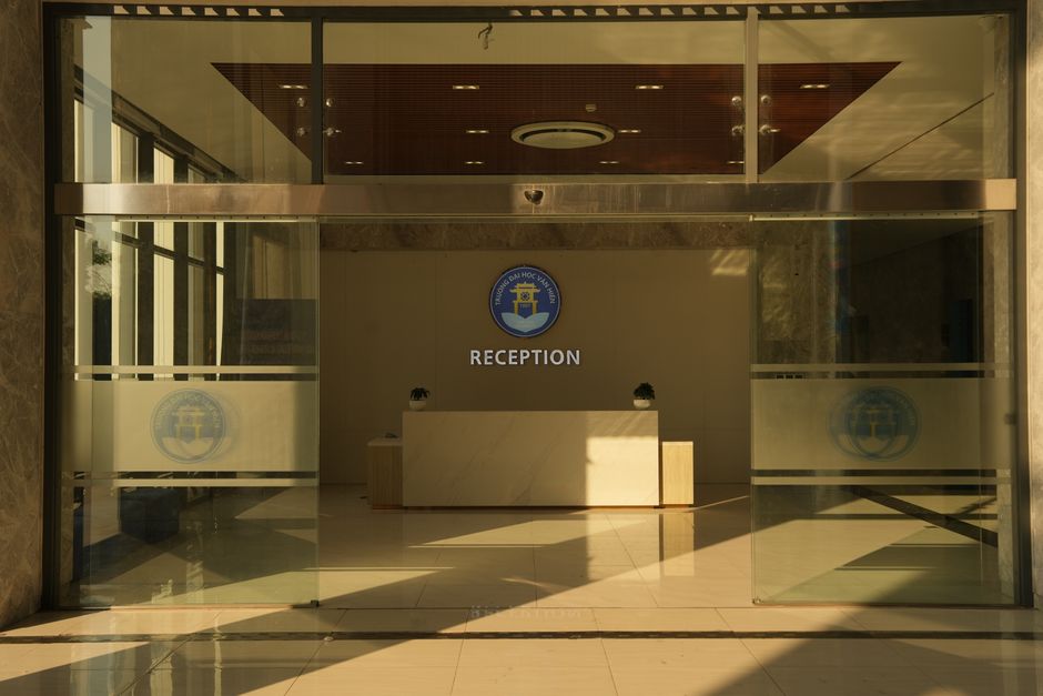 A corporate office building lobby representing a business sponsor