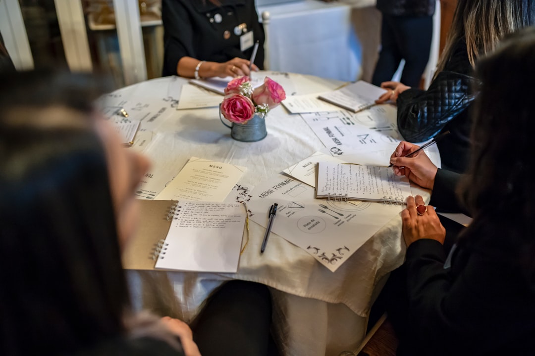 Volunteers planning a fundraising event for an animal rescue