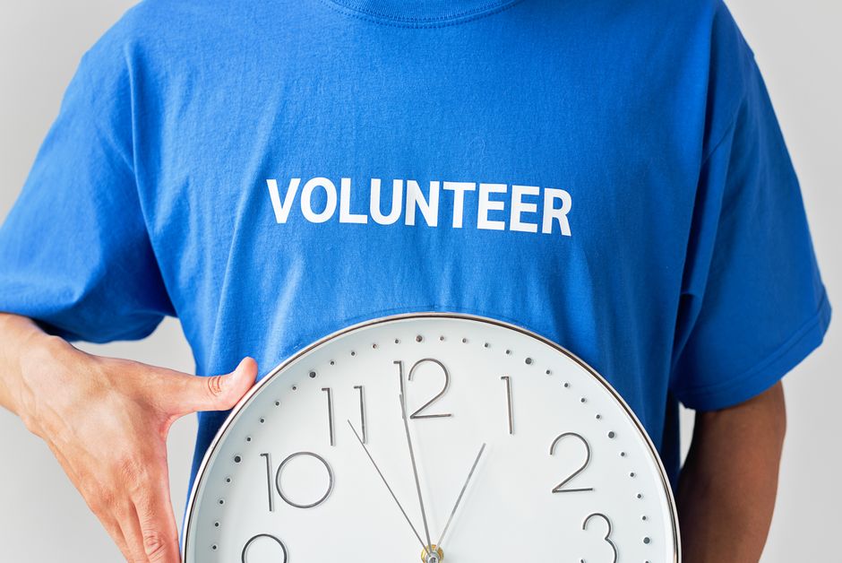 A volunteer donating time and services as an in-kind contribution