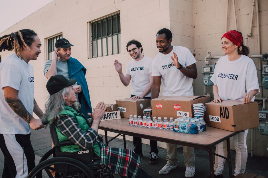 Volunteers announcing a raffle winner at a fundraising event