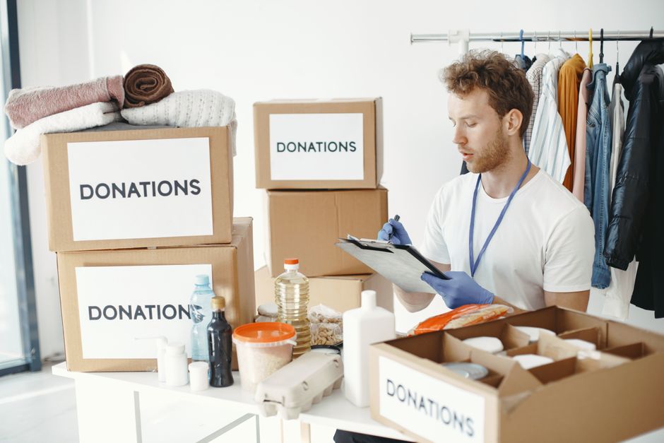 Volunteers providing administrative and facility support at a shelter