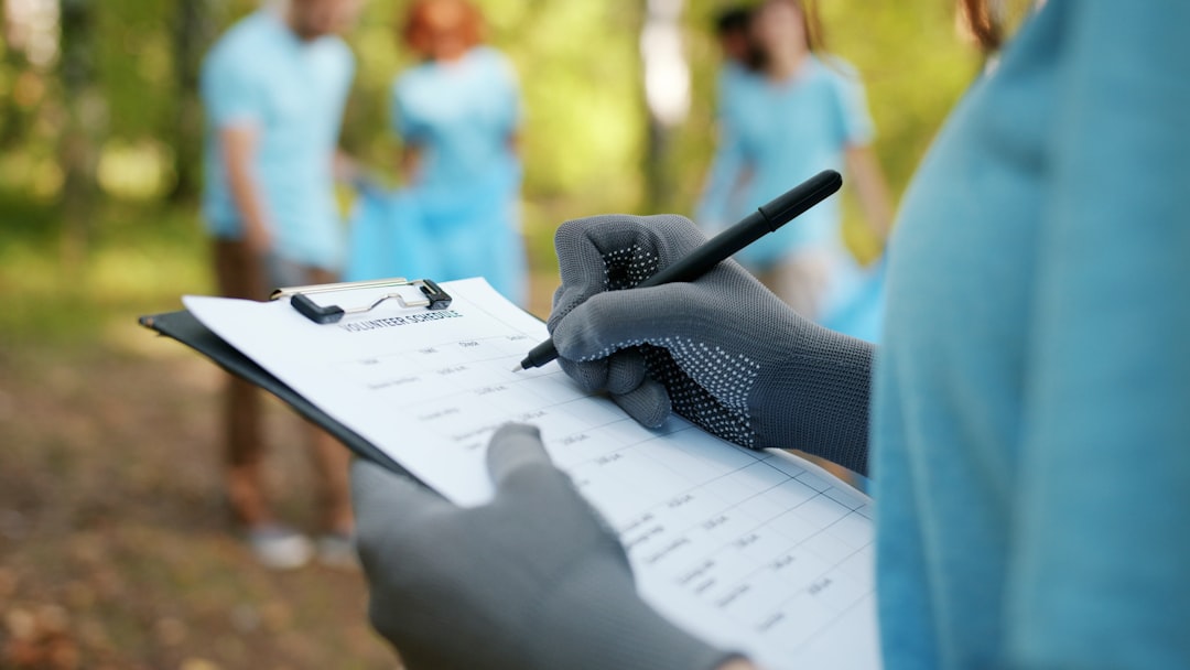 Filling out a volunteer application for a cat rescue