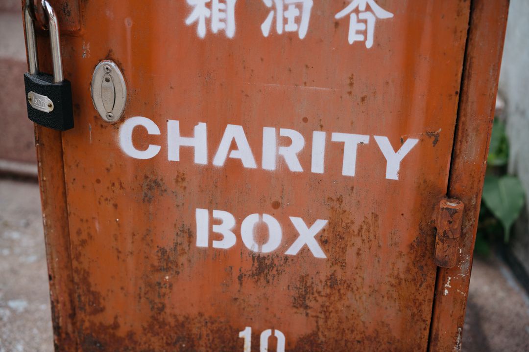 Coins and notes set aside for a regular charitable donation
