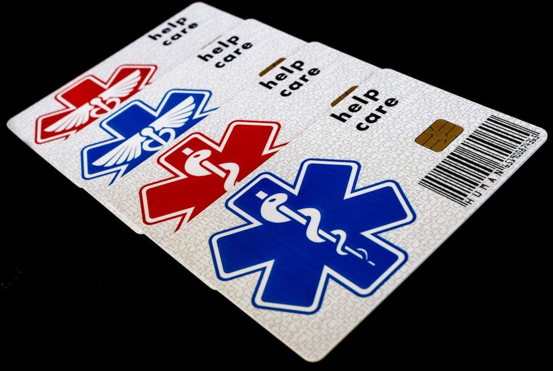 A wallet card naming an emergency caregiver for a cat