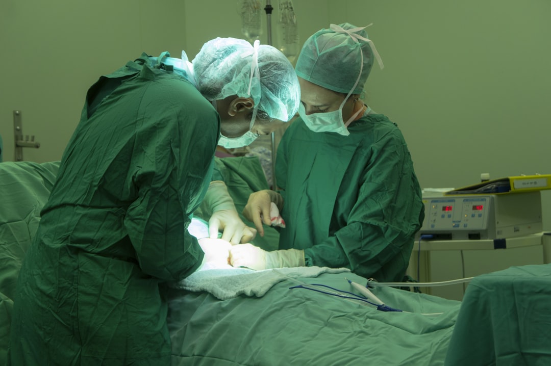 A veterinary team performing community cat sterilisation surgery